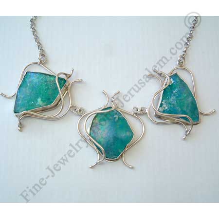 fantasy design in hand made sterling silver necklace with unique pieces of Roman glass