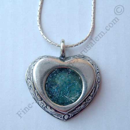 romantic sterling silver leaf motif heart pendant with Roman glass